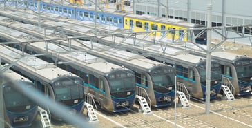 A row of six trains after getting cleaned