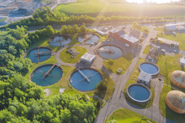 Aerial view of water treatment plants, highlighting the role of water management in preventing Legionella contamination.
