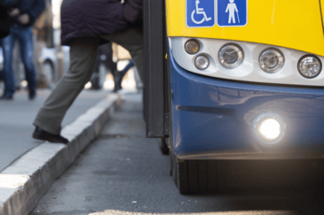 Engineering director getting on a bus assessing how often he should be getting his buses clean 