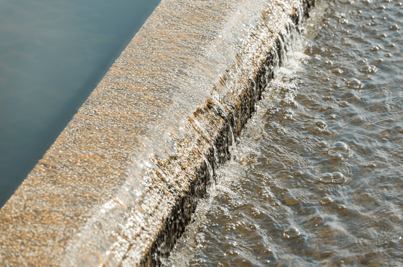  a water recycling drain showing how water recycling can help a business reduce their carbon footprint