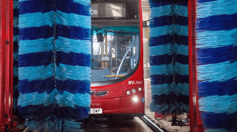 Bus wash system showing customisable solutions as the bus is getting washed