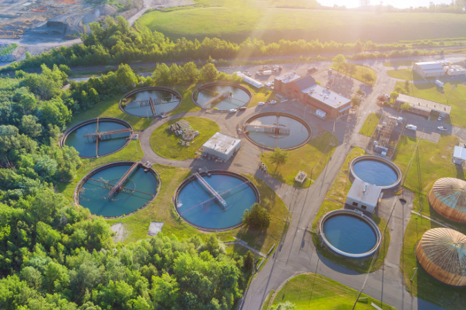  Aerial view of water treatment plants, highlighting the role of water management in preventing Legionella contamination.